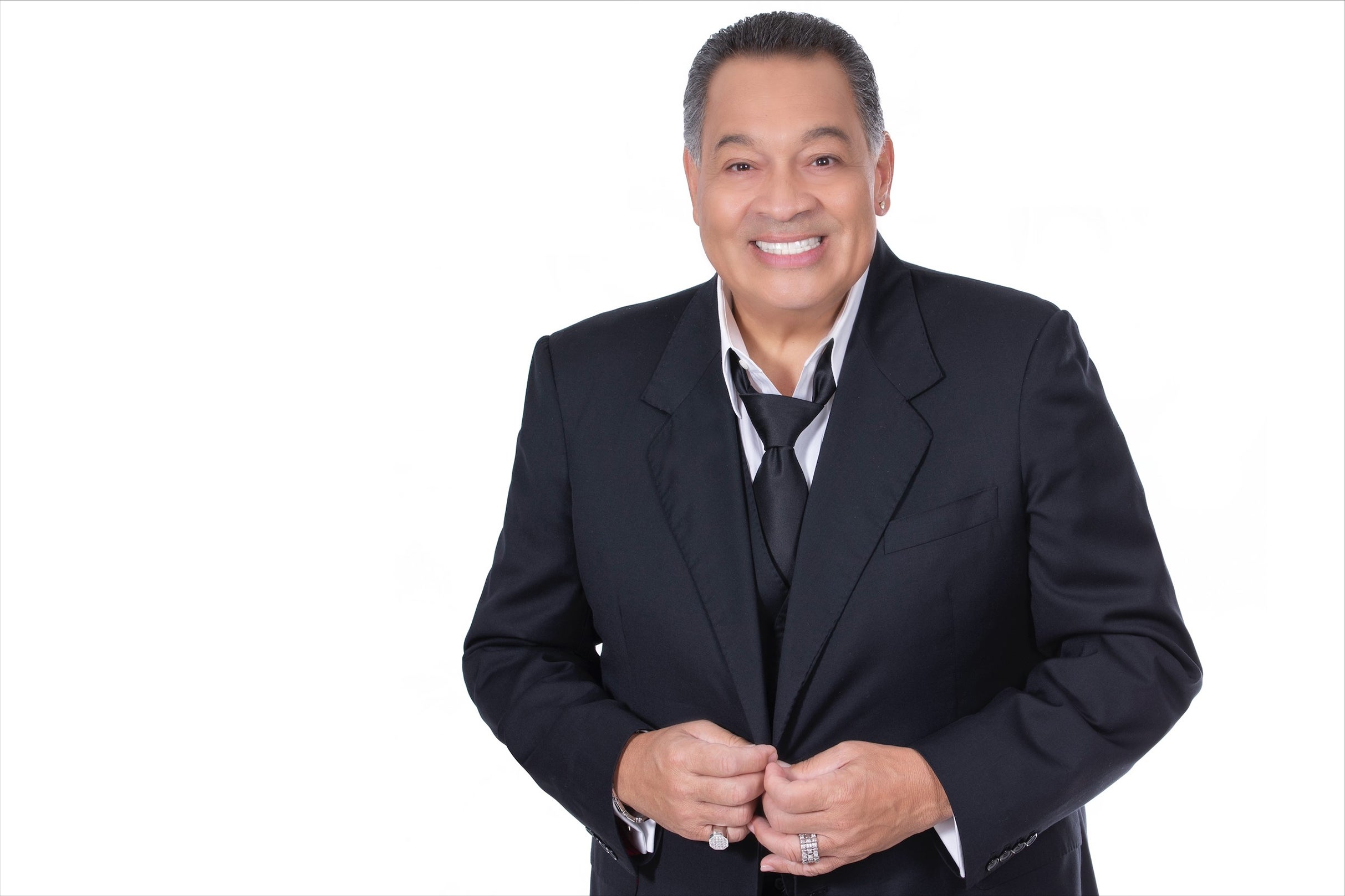 Tito Nieves and El Gran Combo in Miami promo photo for Radio presale offer code