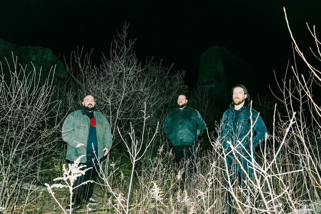 Primitive Man with Otay:Onii, Guitless, and Muñeca Image