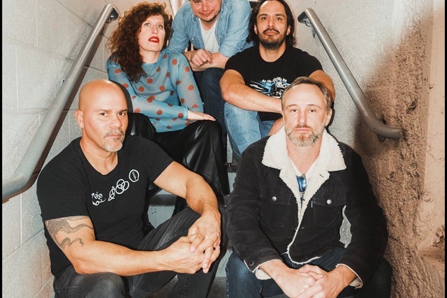 White Ford Bronco: DC's All '90s Band